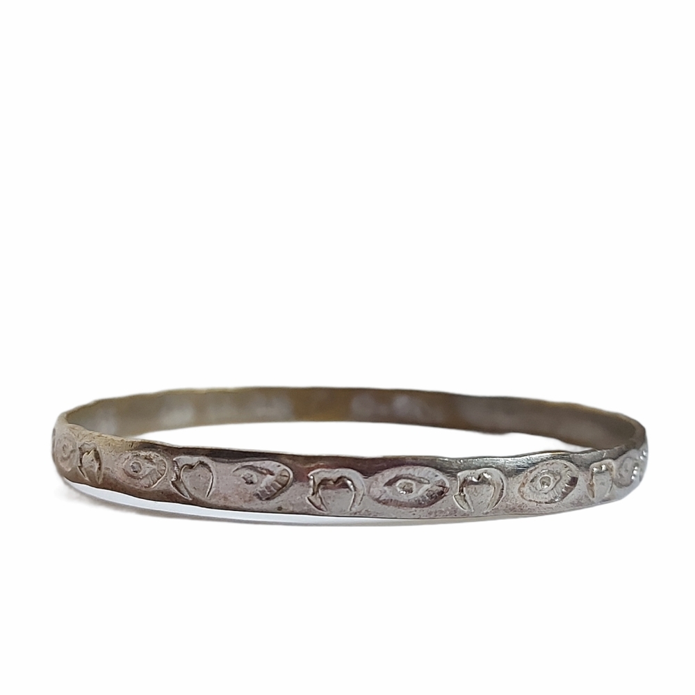 Silver Stamped Taxco Bangle Bracelet Hand Stamped Eye and Heart Motif